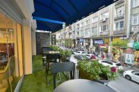 A restaurant or other place to eat at Adamel City Hotel