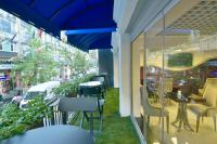 A restaurant or other place to eat at Adamel City Hotel