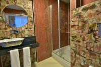 A bathroom at Adamel City Hotel