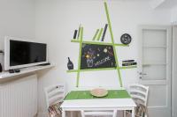Televízia a/alebo spoločenská miestnosť v ubytovaní Apartment Witty Please