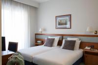 Posteľ alebo postele v izbe v ubytovaní Hotel Marad