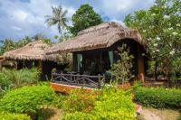 a small hut with a straw roof at Palm Leaf Resort Koh Tao in Ko Tao