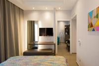 Televízia a/alebo spoločenská miestnosť v ubytovaní Hotel Marad