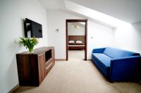 Televízia a/alebo spoločenská miestnosť v ubytovaní Hotel Imperiale