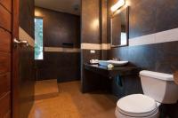 a bathroom with a toilet and a sink at Palm Leaf Resort Koh Tao in Ko Tao