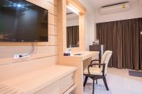 TV a/nebo společenská místnost v ubytování U Duay Gan Garden Home