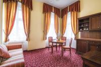 Postel nebo postele na pokoji v ubytování Hotel Ontario