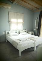 Posteľ alebo postele v izbe v ubytovaní Vetti Rooms