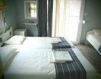 Posteľ alebo postele v izbe v ubytovaní Vetti Rooms