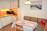 Kuchyňa alebo kuchynka v ubytovaní Tennladen Apartments