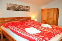 Posteľ alebo postele v izbe v ubytovaní Tennladen Apartments