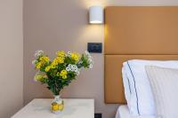 A bed or beds in a room at B&B Giacomino