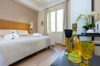 A bed or beds in a room at B&B Giacomino