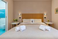 A bed or beds in a room at B&B Giacomino