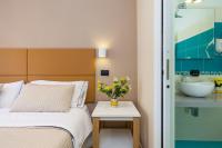 A bed or beds in a room at B&B Giacomino