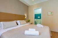 A bed or beds in a room at B&B Giacomino