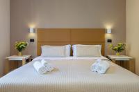 A bed or beds in a room at B&B Giacomino