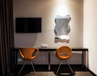 TV a/nebo společenská místnost v ubytování Amazon Hotel