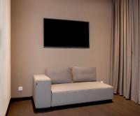 TV a/nebo společenská místnost v ubytování Amazon Hotel