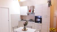 Kuchyňa alebo kuchynka v ubytovaní Casa Principe di Napoli