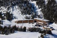 a large building in the snow on a mountain at Sunshine Mountain Lodge in Banff