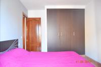 Posteľ alebo postele v izbe v ubytovaní Apartamento Huelin