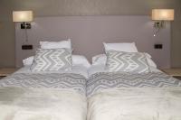 Postel nebo postele na pokoji v ubytování Hotel Presa