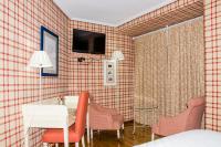 TV a/nebo společenská místnost v ubytování Hotel Presa