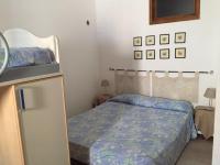 Postel nebo postele na pokoji v ubytování Casa Mare San Vito Lo Capo