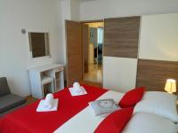 Posteľ alebo postele v izbe v ubytovaní Petra apartment