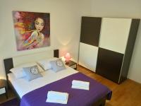 Posteľ alebo postele v izbe v ubytovaní Petra apartment