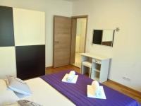 Posteľ alebo postele v izbe v ubytovaní Petra apartment