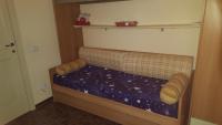 Łóżko lub łóżka w pokoju w obiekcie B&B Le Mille E Una Notte