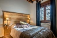 Cama o camas de una habitación en El Aserradero
