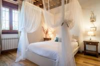 Cama o camas de una habitación en El Aserradero