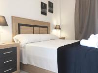 Posteľ alebo postele v izbe v ubytovaní Anacasa Oasis Beach II Marineta AP2116