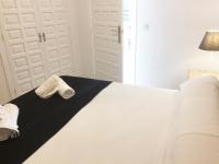Posteľ alebo postele v izbe v ubytovaní Anacasa Oasis Beach II Marineta AP2116