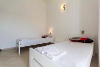 Łóżko lub łóżka w pokoju w obiekcie Apartments Gloria