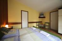 A bed or beds in a room at Hotel Melis
