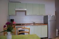 Kuchyňa alebo kuchynka v ubytovaní Apartments Robert