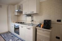 A kitchen or kitchenette at Amira Luxury Apartments