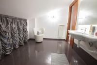 A bed or beds in a room at Amira Luxury Apartments