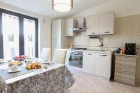 A kitchen or kitchenette at Amira Luxury Apartments