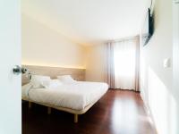 Postel nebo postele na pokoji v ubytování El Pi de Sant Just - Habitacions i Apartaments