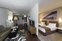Opera Suite Hotelにあるベッド