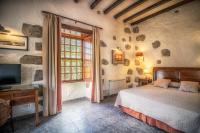 Postel nebo postele na pokoji v ubytování Hotel Rural LIVVO Maipez