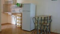 Kuchyň nebo kuchyňský kout v ubytování Nimpha Bungalows