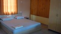 Postel nebo postele na pokoji v ubytování Nimpha Bungalows