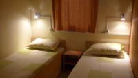 Postel nebo postele na pokoji v ubytování Nimpha Bungalows