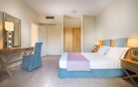 Postel nebo postele na pokoji v ubytování Alkion Hotel